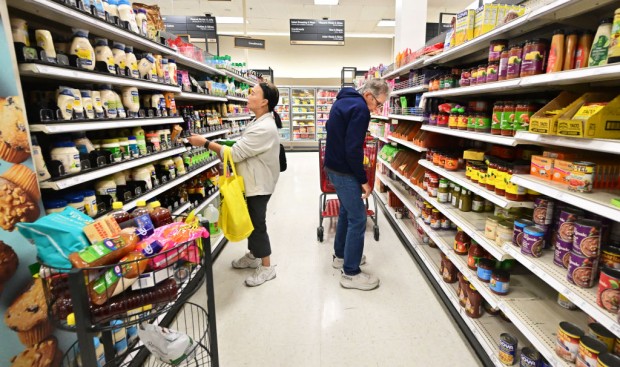 Americans Feeling More Optimistic as Prices Cool and Paychecks Increase
