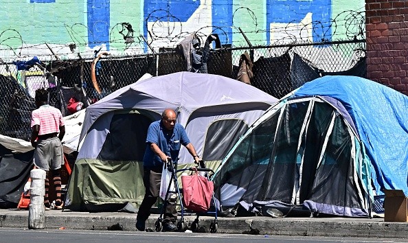 Tents for the homeless are seen on August 16, 2023 on a Skid Row sidewalk in Los Angeles, California, where homelessness has seen a 10 percent surge compared to last year. 