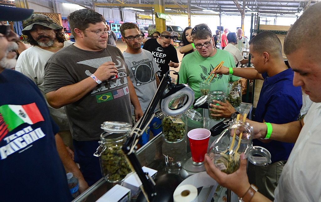  Is it Time to Invest in Weed? Pot Stocks Rise on Reclassification, But Caution Urged